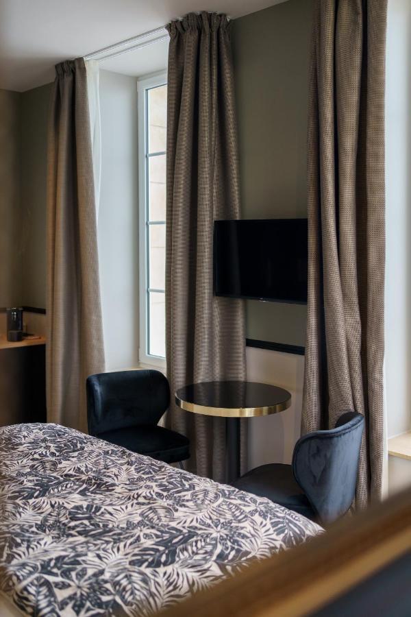 Hotel De La Plage Lion-sur-Mer Exteriör bild